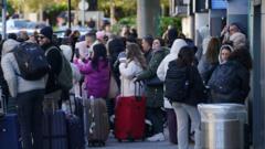 Gatwick Airport security detains two individuals after discovering suspicious package.