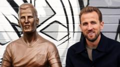 Kane honored with statue near childhood team, feels deeply moved.