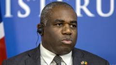 Lammy defends Chagos Islands agreement amid political backlash.