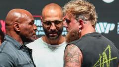 Mike Tyson and Jake Paul's boxing match sparks controversy and media frenzy.