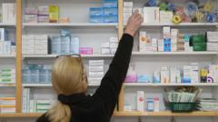 Pharmacies reduce hours to protest funding cuts.