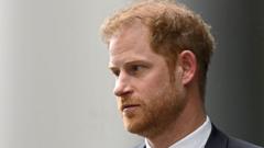 Prince Harry remains in lawsuit against Sun publisher, court hears