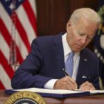 Biden signs 50 bills, including 1 backed by Paris Hilton, on Christmas Eve