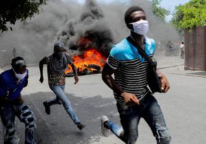 A survivor of the worst gang attack on Haitian journalists says colleagues were cut down by bullets