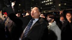 South Koreans cheer president's decision to pull troops from conflict zone.