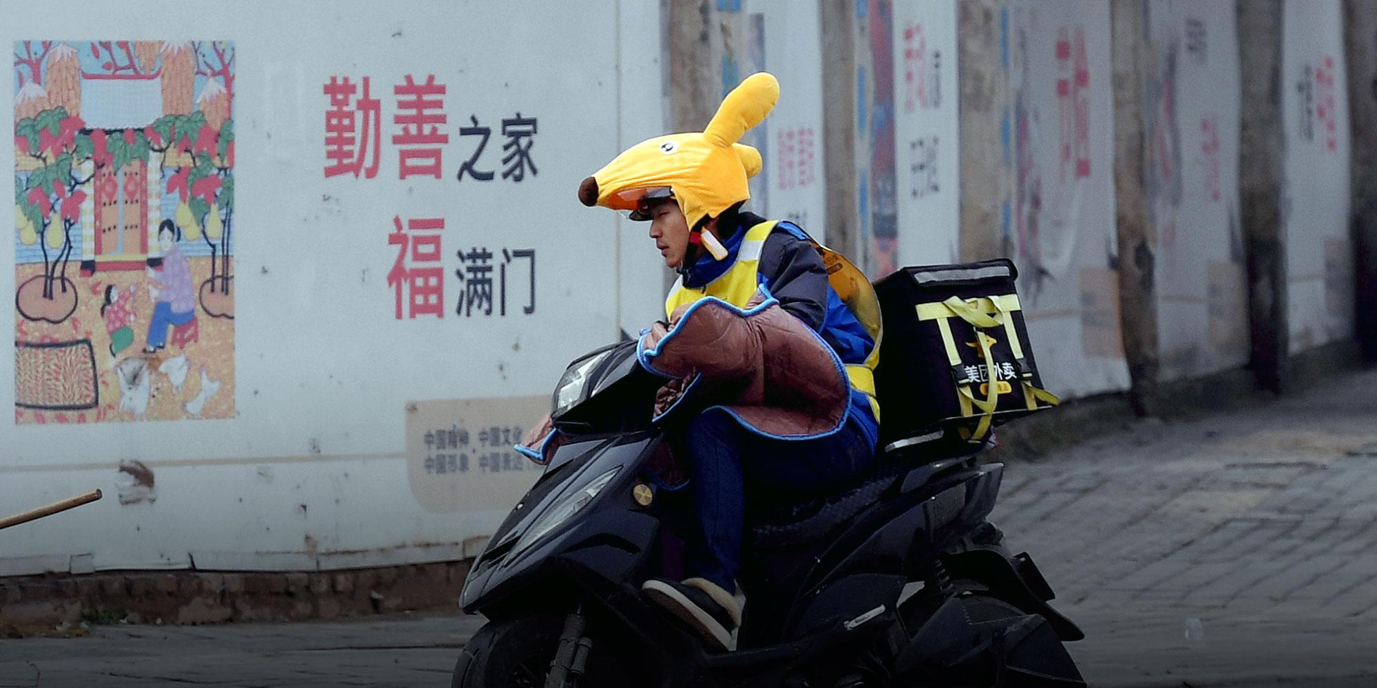 China's army of food delivery drivers get by with help from discount 'loving meals'