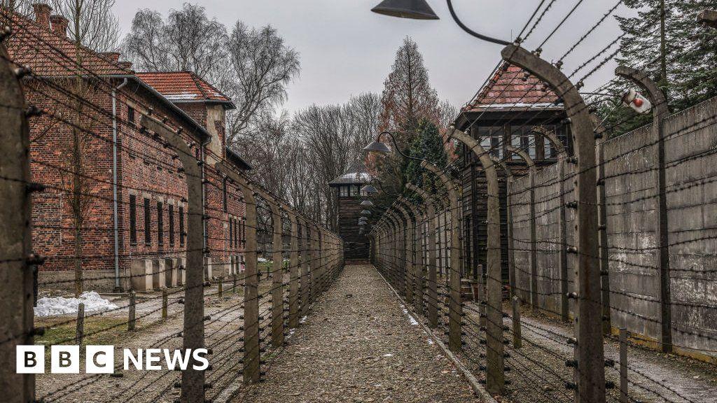 Barstool Sports founder retracts Auschwitz tour offer to customer in antisemitic sign incident
