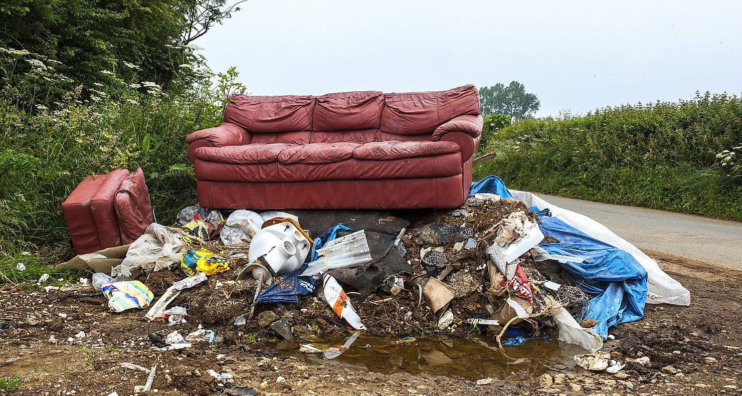 Man faces massive fine after dumping 500 pounds of trash in quiet town street — here’s what authorities found at the scene